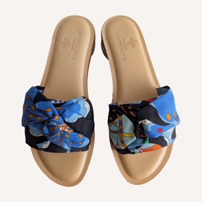 Flat silk and leather sandal Wear your summer sandal like a jewel.