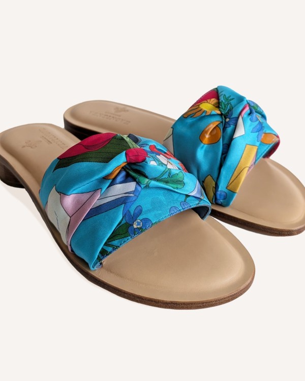 Flat silk and leather sandal Wear your summer sandal like a jewel.