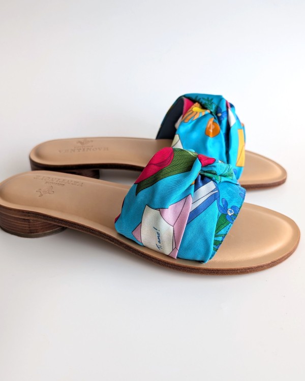 Flat silk and leather sandal Wear your summer sandal like a jewel.