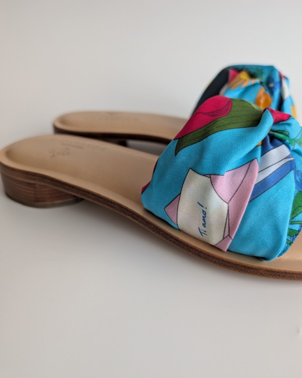 Flat silk and leather sandal Wear your summer sandal like a jewel.