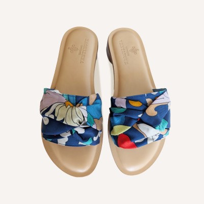 Flat silk and leather sandal Wear your summer sandal like a jewel.