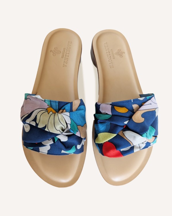 Flat silk and leather sandal Wear your summer sandal like a jewel.