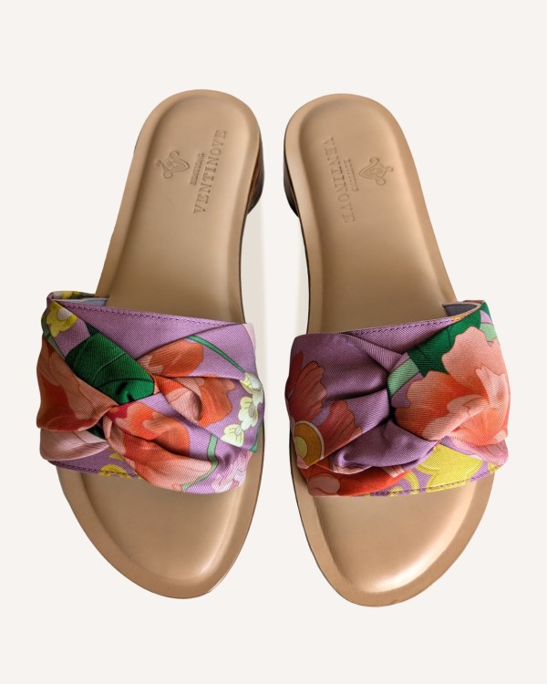 Flat silk and leather sandal Wear your summer sandal like a jewel.