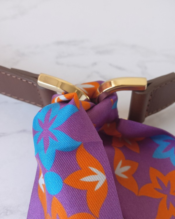 Buy the leather belt that closes with a scarf!